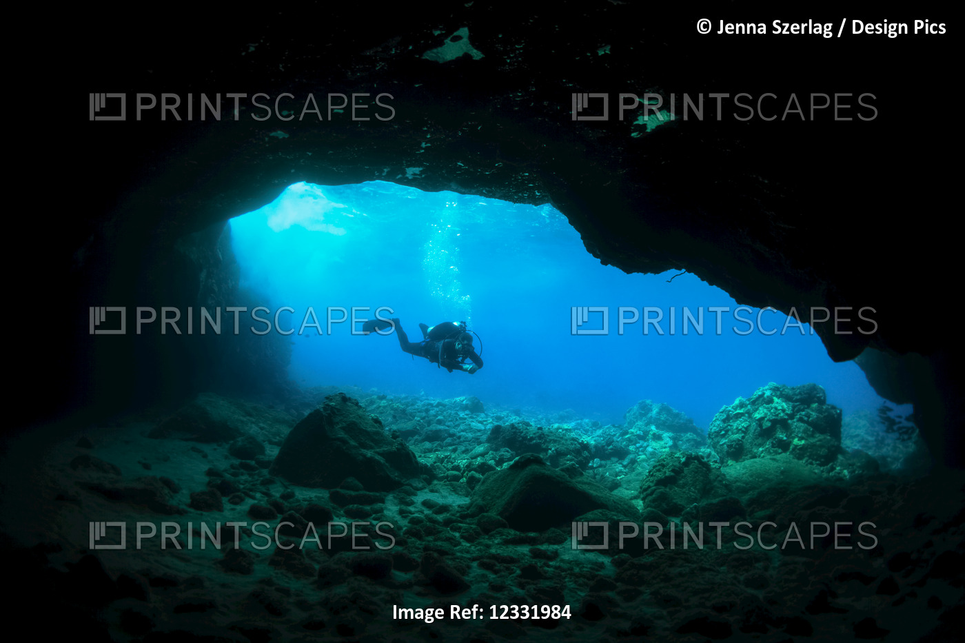 Silhouette of a scuba diver in a cave; Makena, Maui, Hawaii, United States of ...
