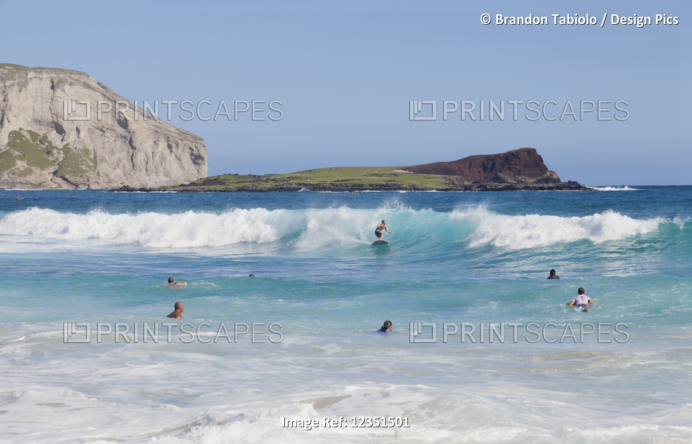 Bodyboarders catching waves at Makapu'u Beach; Waimanalo, Oahu, Hawaii, United ...