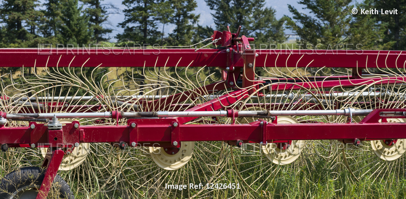 Close-up of a red combine harvester; British Columbia, Canada
