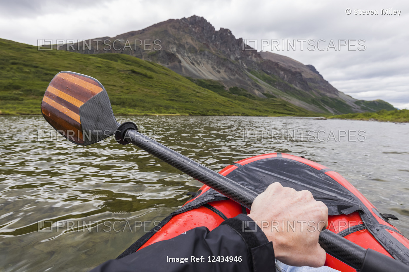 Point of view shot of paddling a pack raft on Landmark Gap Lake near the Denali ...