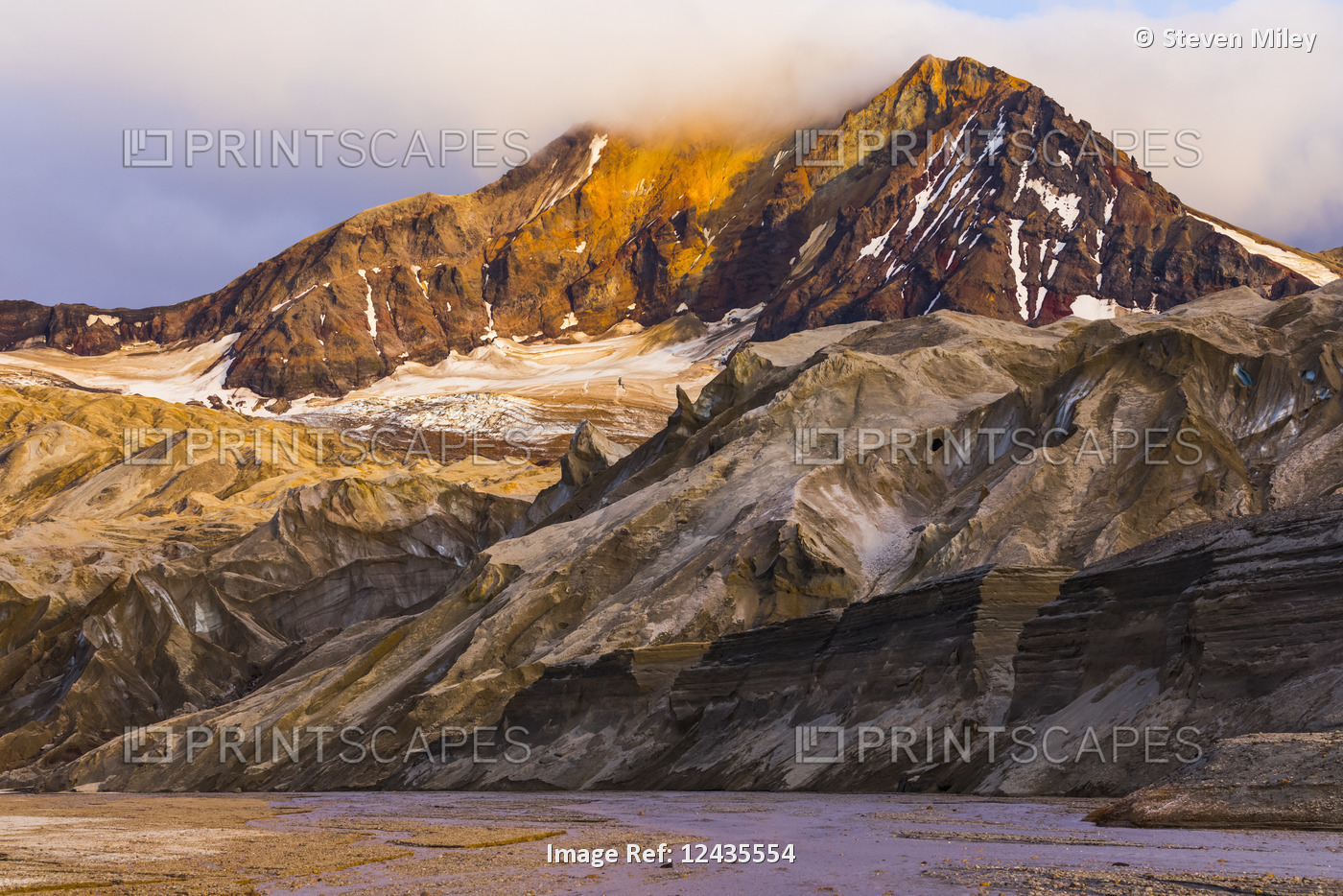 The eastern peak of Trident Volcano rises above the ash-covered Knife Creek ...