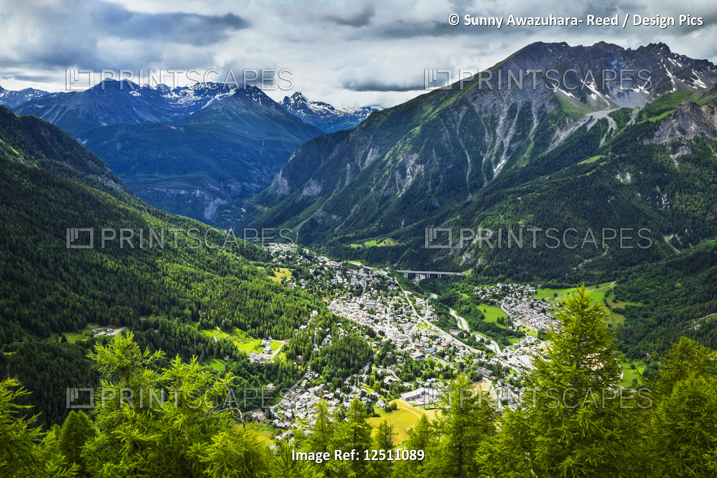 Aerial view of Courmayeur city surrounded by mountains; Courmayeur, Aosta ...