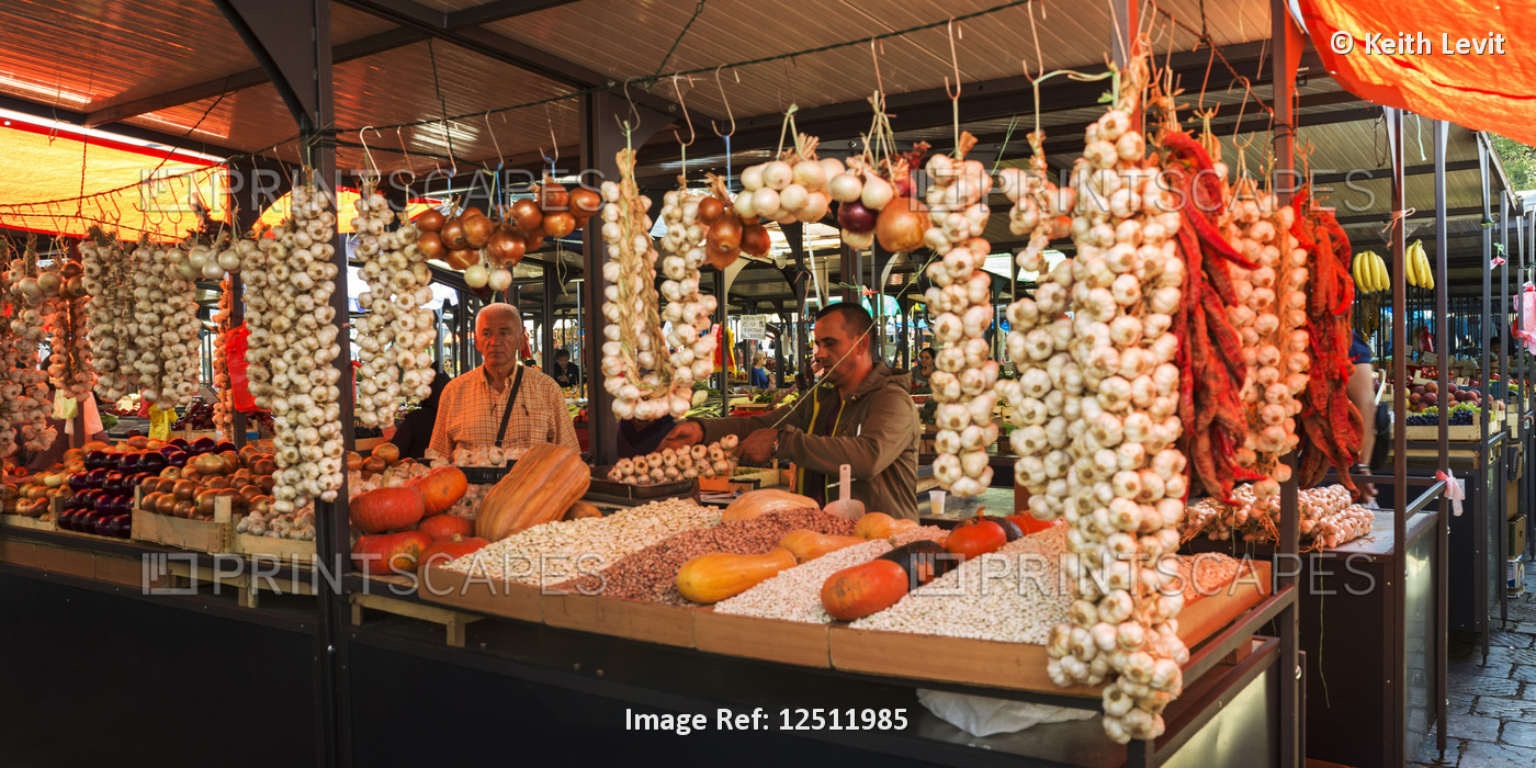 Fresh garlic hanging for sale in the Belgrade Green Market; Belgrade, ...