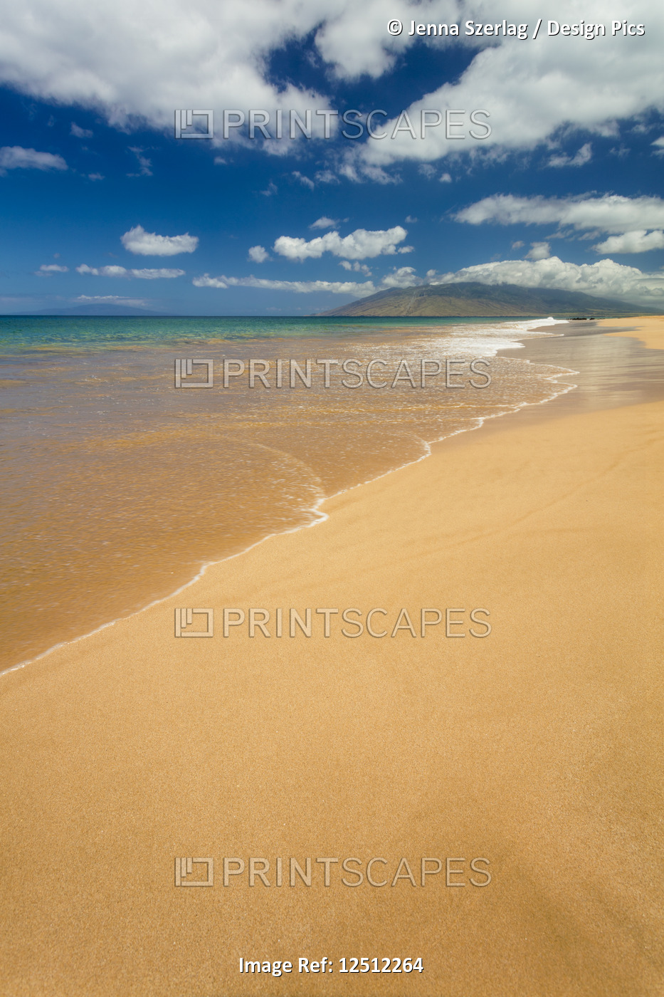 Turquoise ocean water and golden sand on Keawakapu Beach; Wailea, Maui, Hawaii, ...