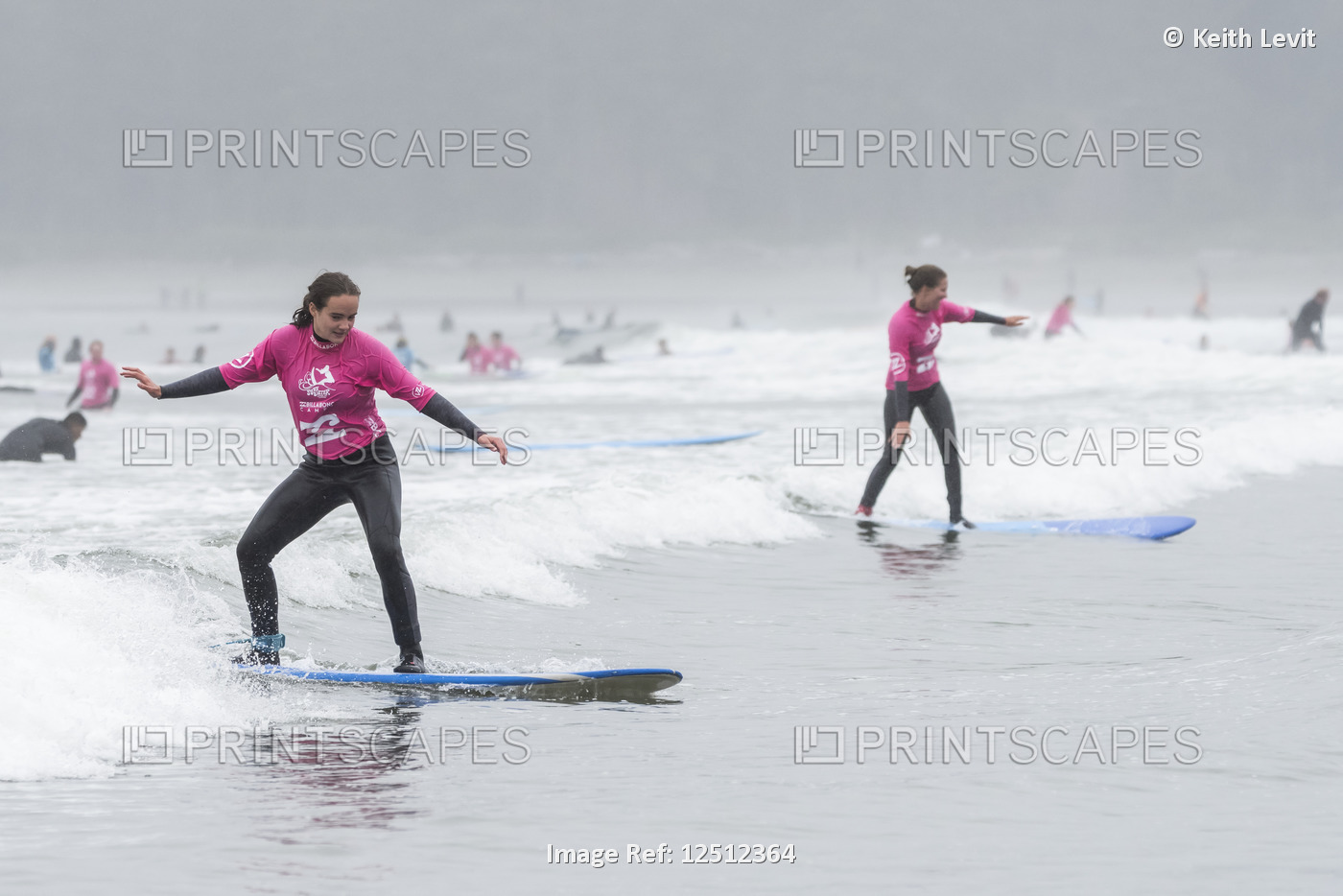 Girls learning to surf at Cox Bay Beach, Pacific Rim National Park, Vancouver ...
