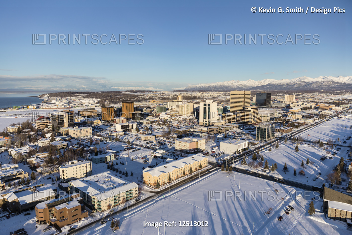 Aerial view of snow covering downtown Anchorage and the Chugach and Talkeetna ...