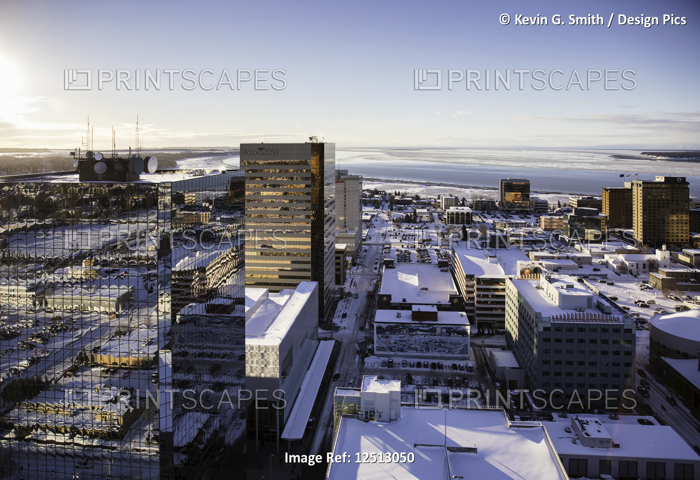 Aerial view of glass facade office buildings in downtown Anchorage, Cook Inlet ...
