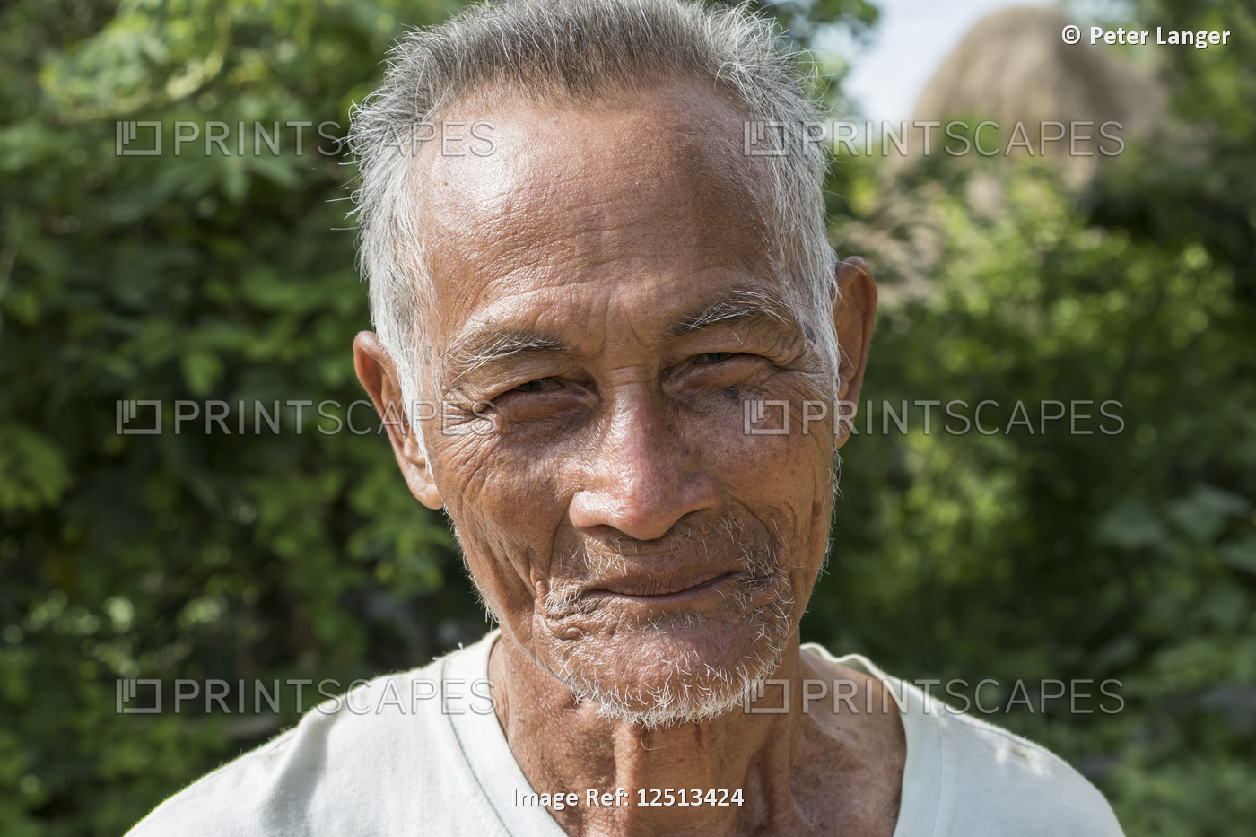 Portrait of a senior Cambodian man; O Sra Lav, Cambodia