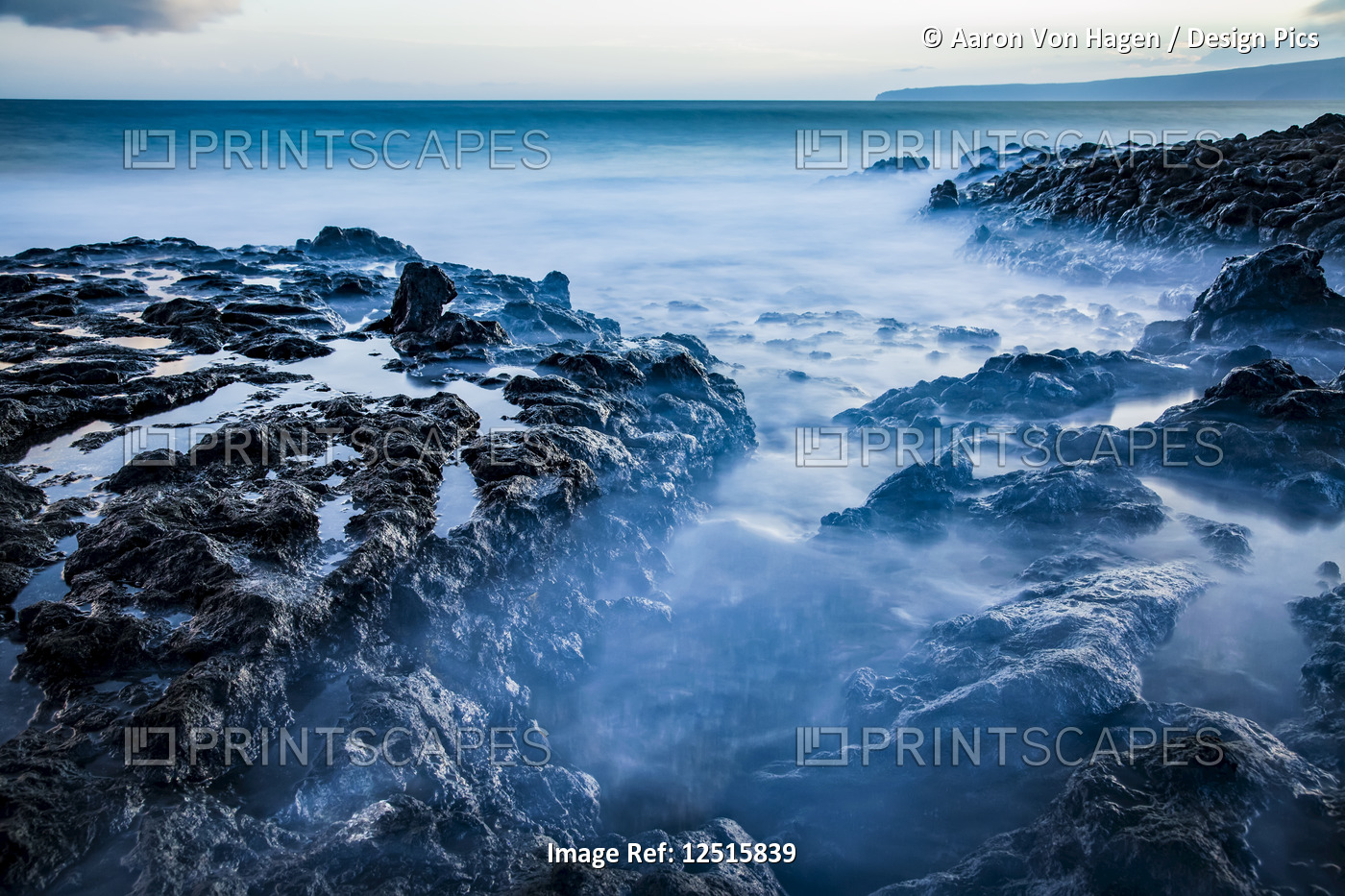 Long exposure of tide pools along the coastline and a view of the Pacific ...