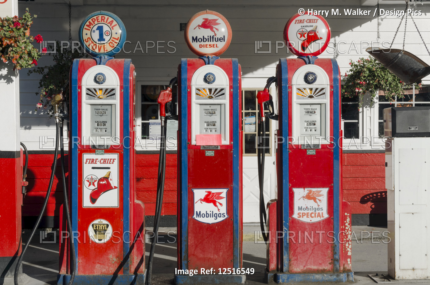 Gustavus Dray, a pre-WWII replica Mobil gas station, an active gas station and ...