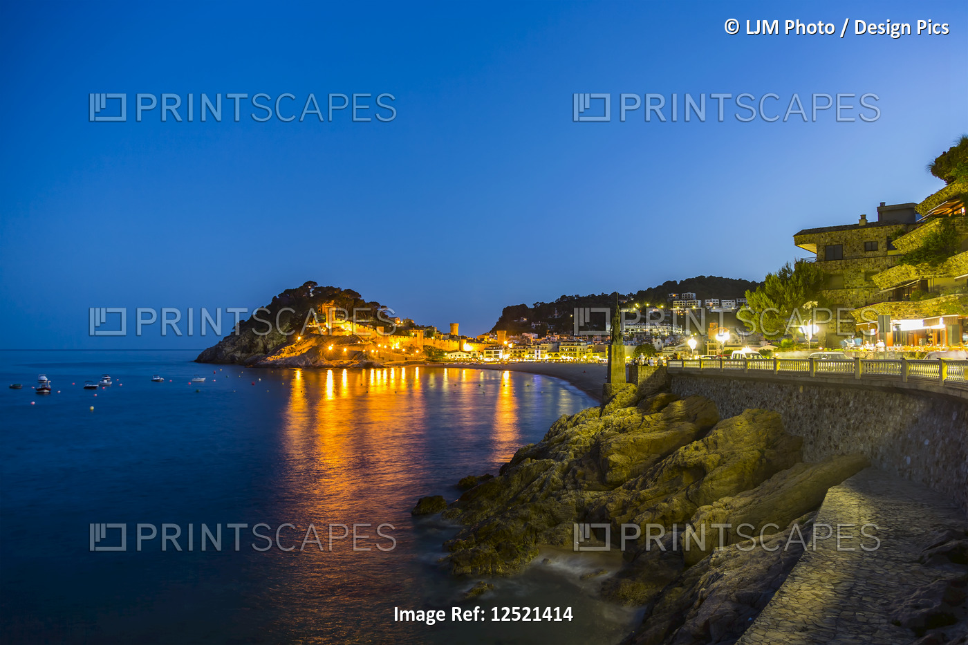 Night view from Tossa de Mar of Castell de Tossa, which was built in 1187; ...