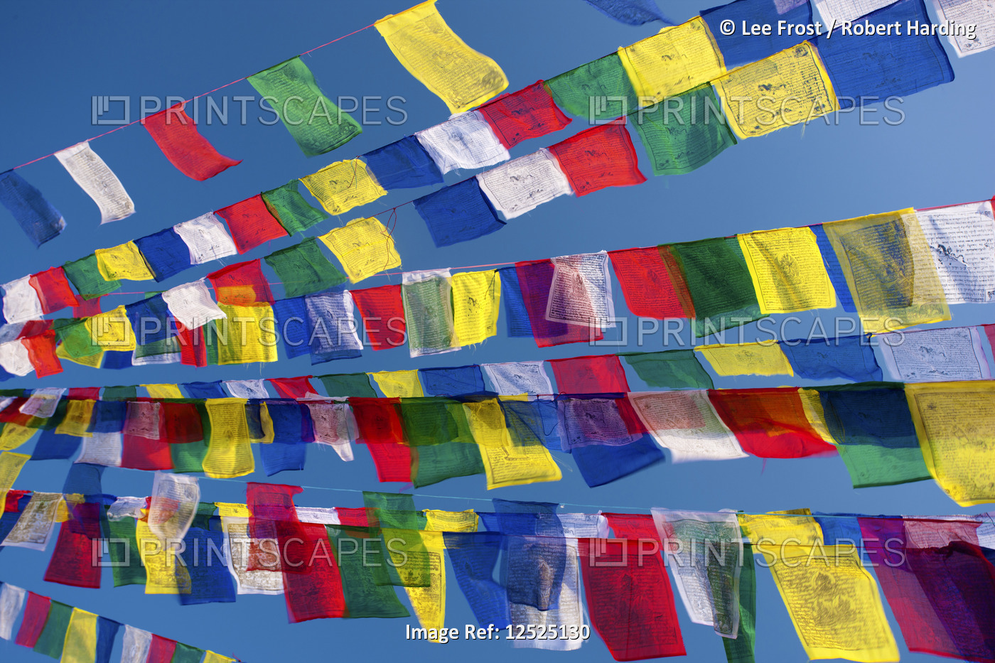 Colourful prayer flags against clear blue sky at Bodhnath Stupa (Boudhanth) (Boudha), one of the hol