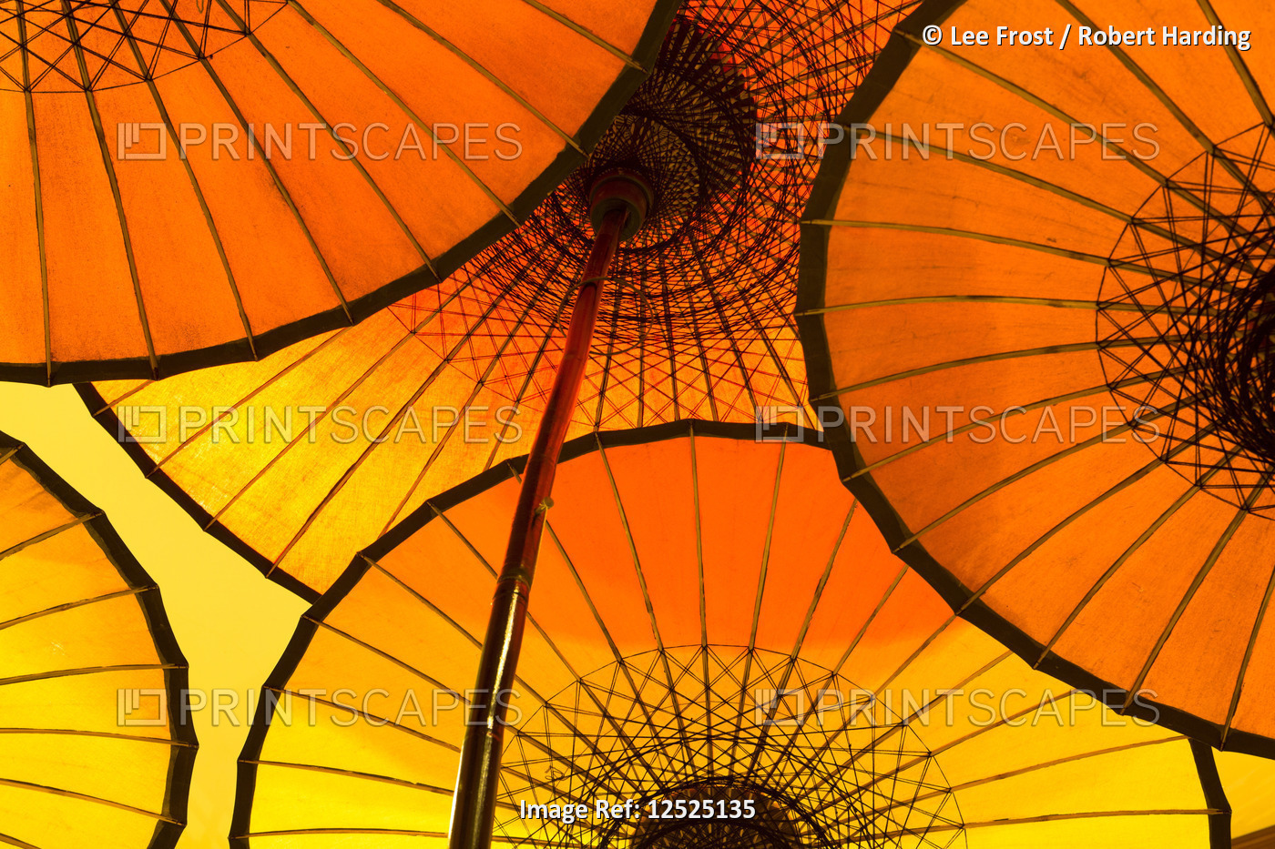 Colourful yellow and orange parasols backlit, Bagan, Myanmar (Burma), Asia