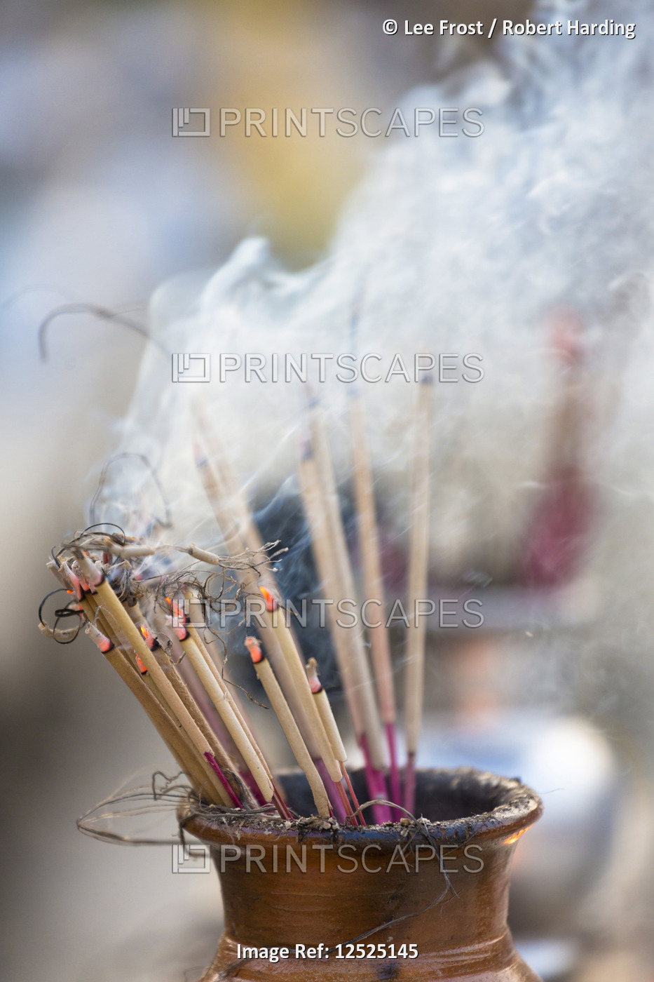 Incense burning at Shwedagon Paya (Pagoda), Yangon (Rangoon), Myanmar (Burma), Asia