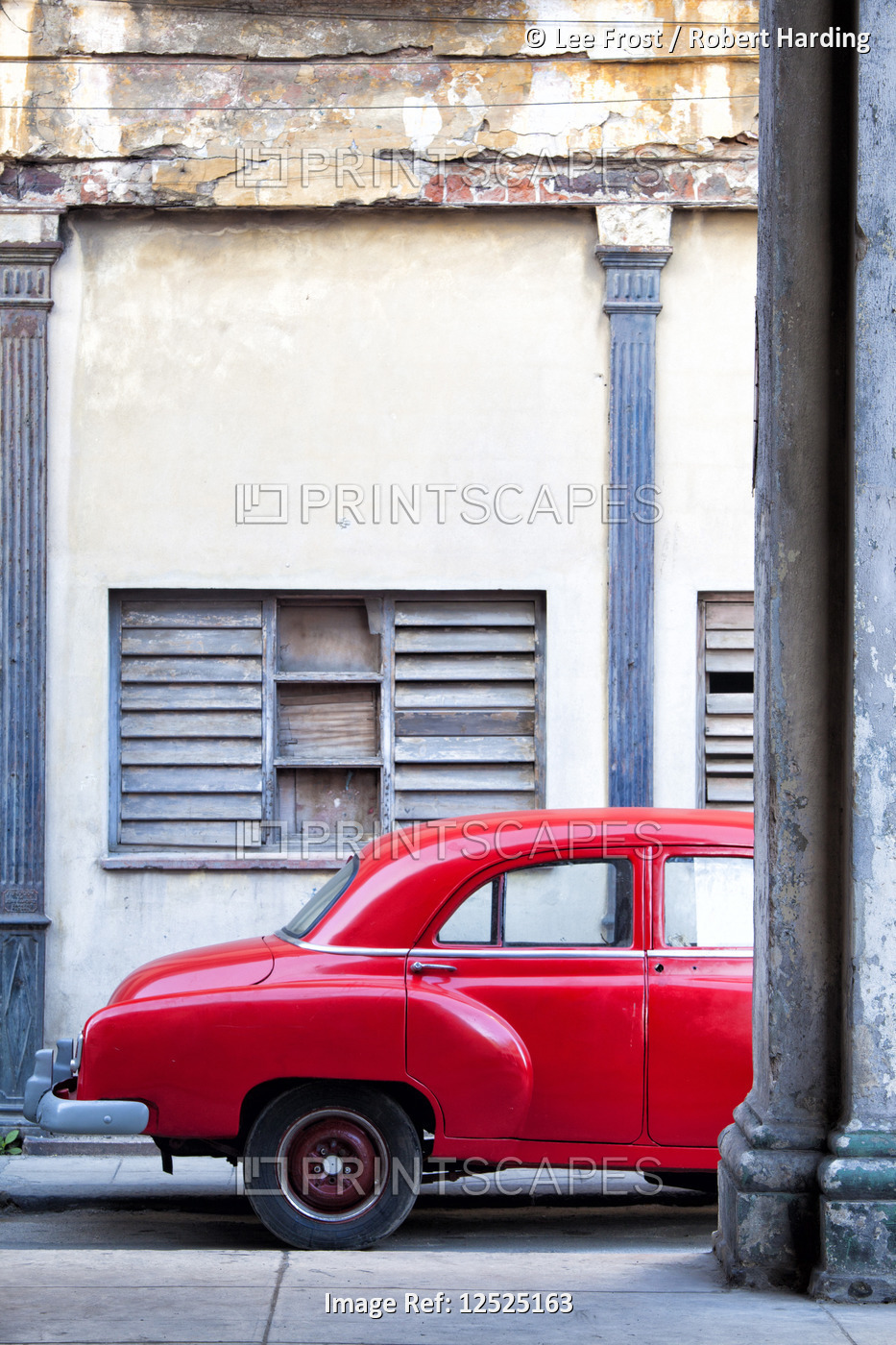 Red vintage American car parked on a street in Havana Centro, Havana, Cuba, West Indies, Central Ame