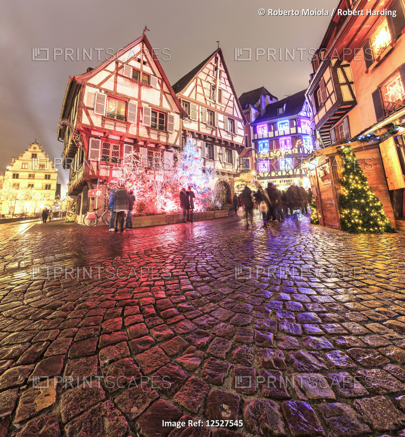 Panorama of typical houses enriched by Christmas ornaments and lights at dusk, Colmar, Haut-Rhin dep