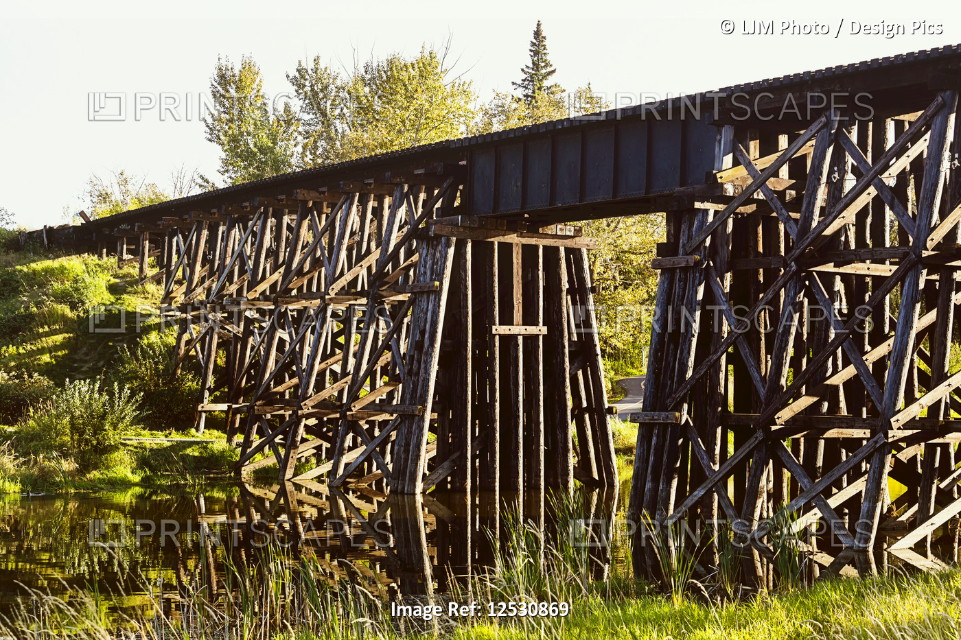 Old Iconic Wooden Trestle Bridge Over The Sturgeon River; St. Albert. Alberta, ...