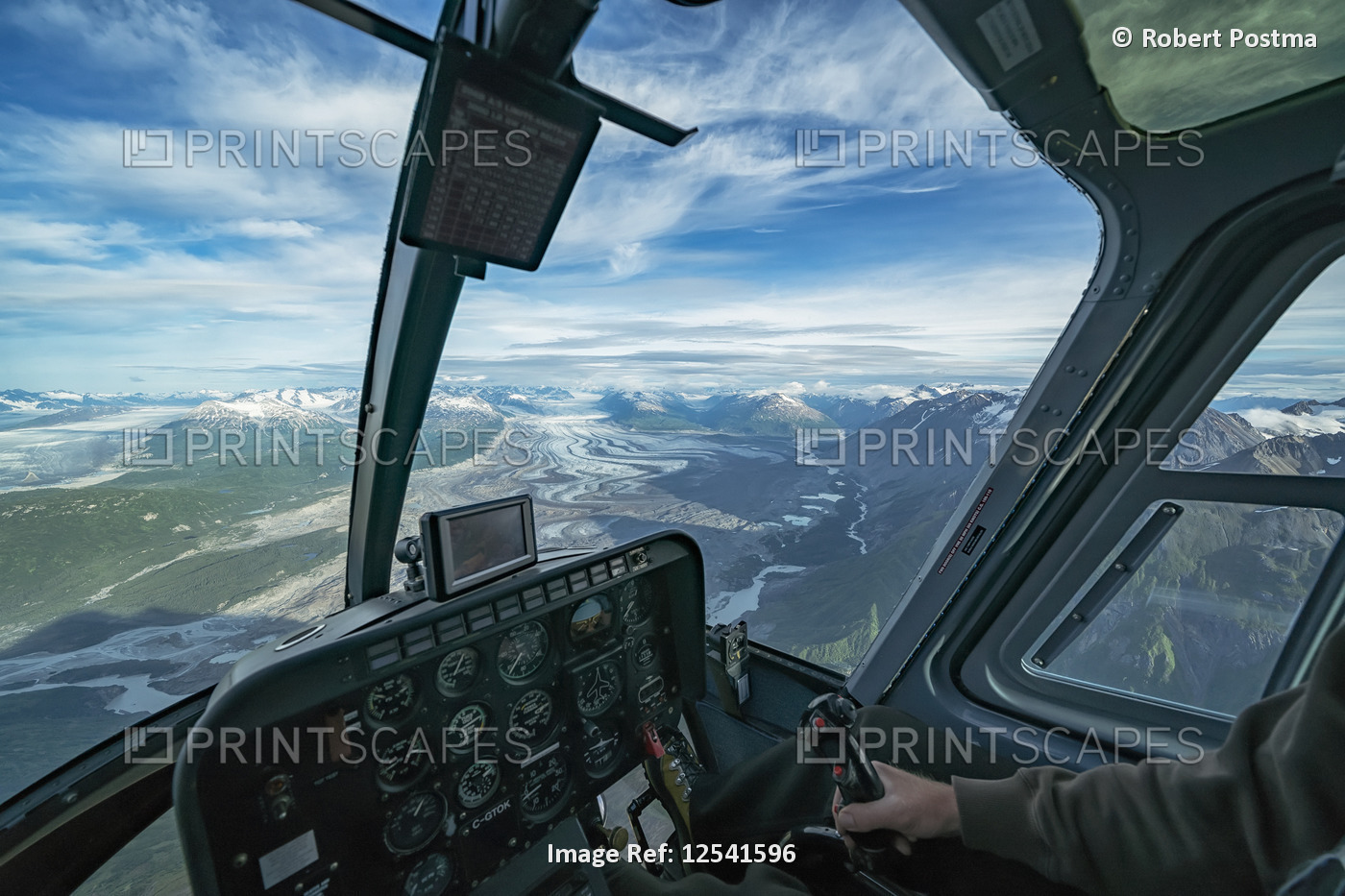 Flying in a helicopter over the icefields in Kluane National Park, near Haines ...