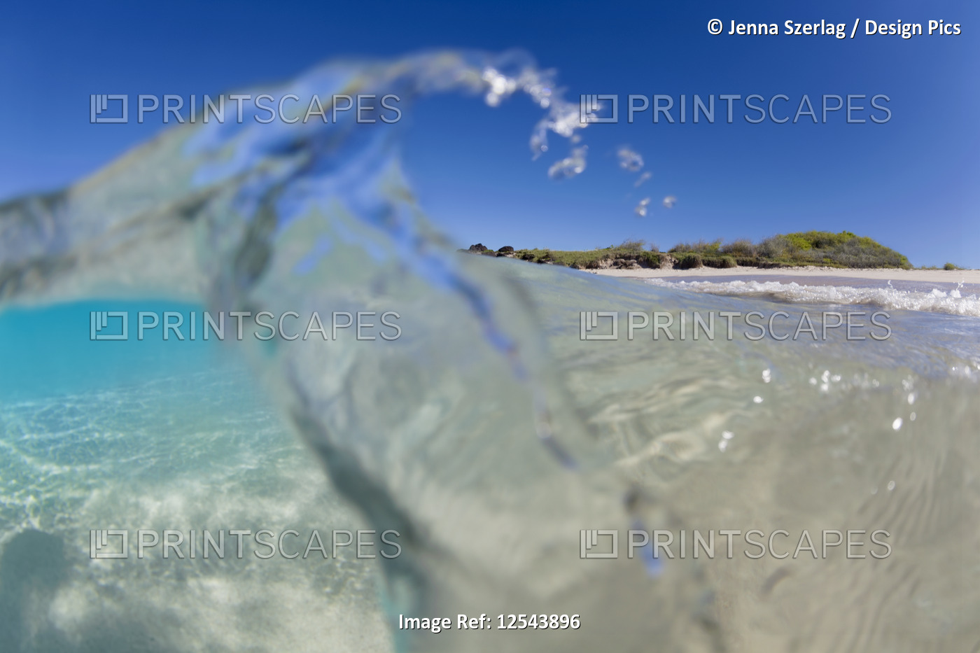 Split view of crystal, clear water and beach, Kua Bay; Island of Hawaii, ...