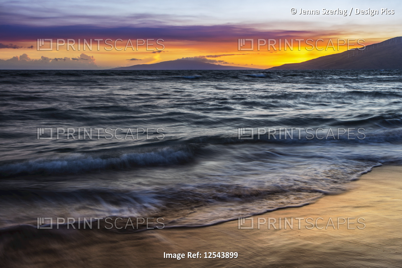 A sunset view with soft water from North Kihei; Maui, Hawaii, United States of ...