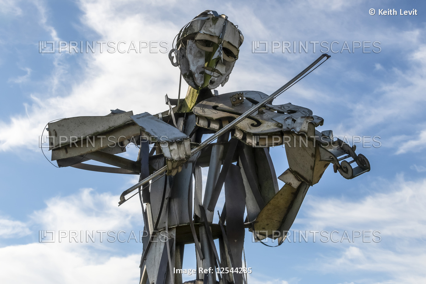 Sculpture of a musician playing a fiddle, 'Let the Dance Begin' in Strabane, a ...
