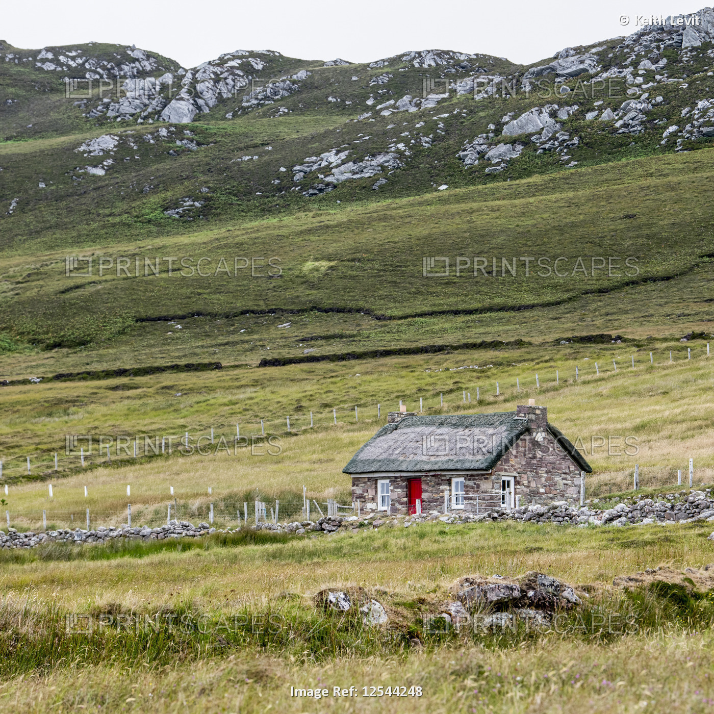 Stone house on a farm field in the mountains, Achill Island, Wild Atlantic Way; ...