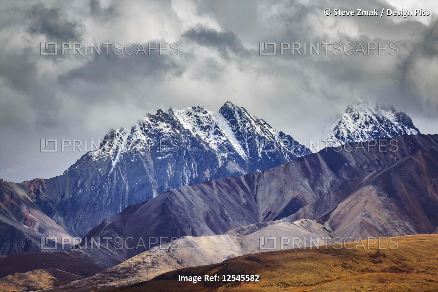 Layers of hills and mountains line Polychrome Pass along the Kantishna ...