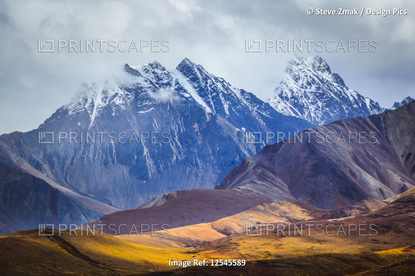 Layers of hills and mountains line Polychrome Pass along the Kantishna ...