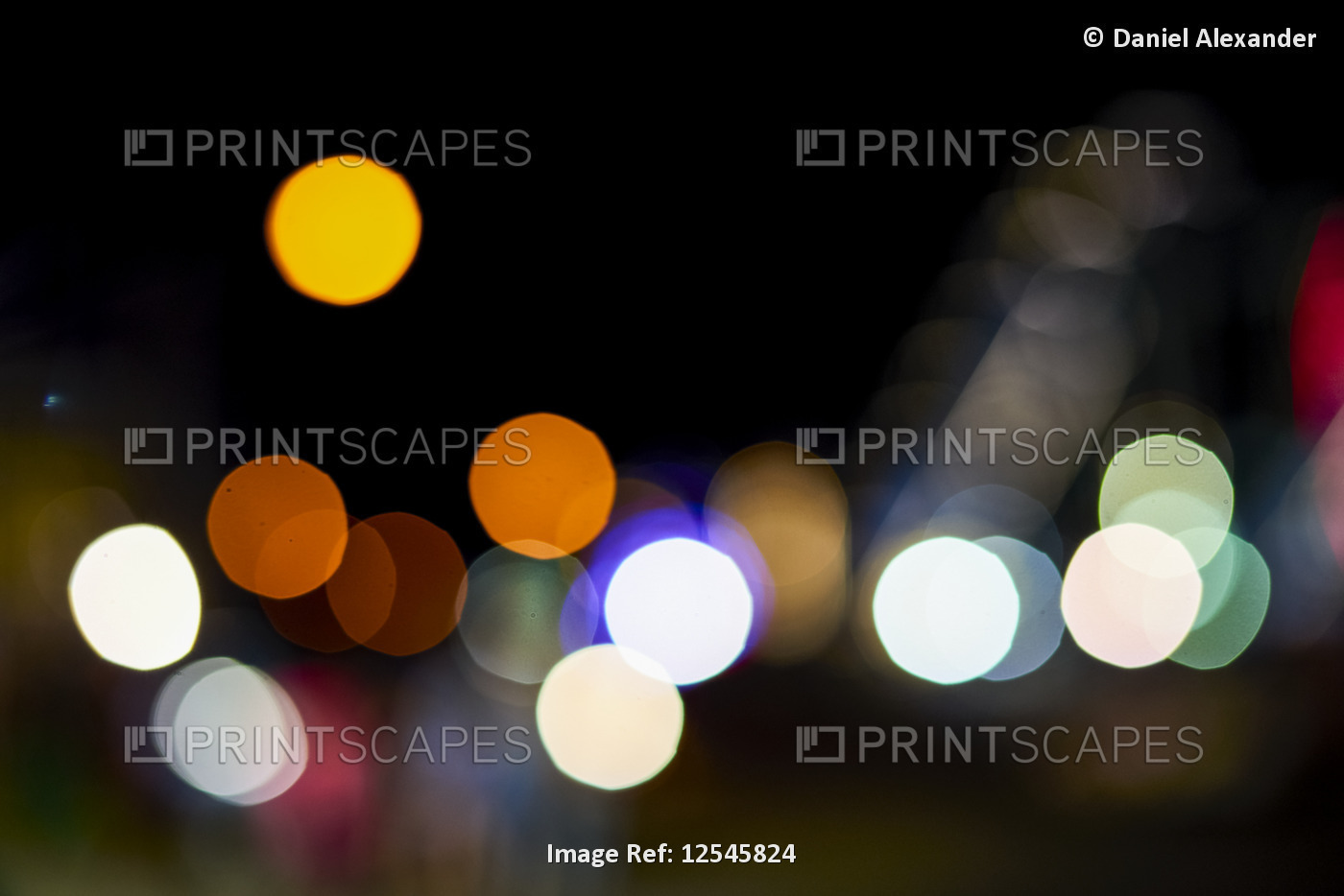Out of focus night coloured lights at Coney Island and Luna Park; Coney Island, ...