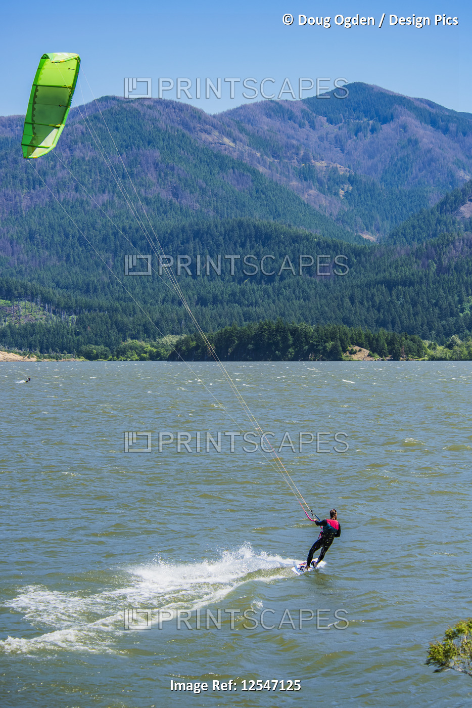 Kitesurfer riding the wind on the Columbia River near Stevenson; Washington, ...