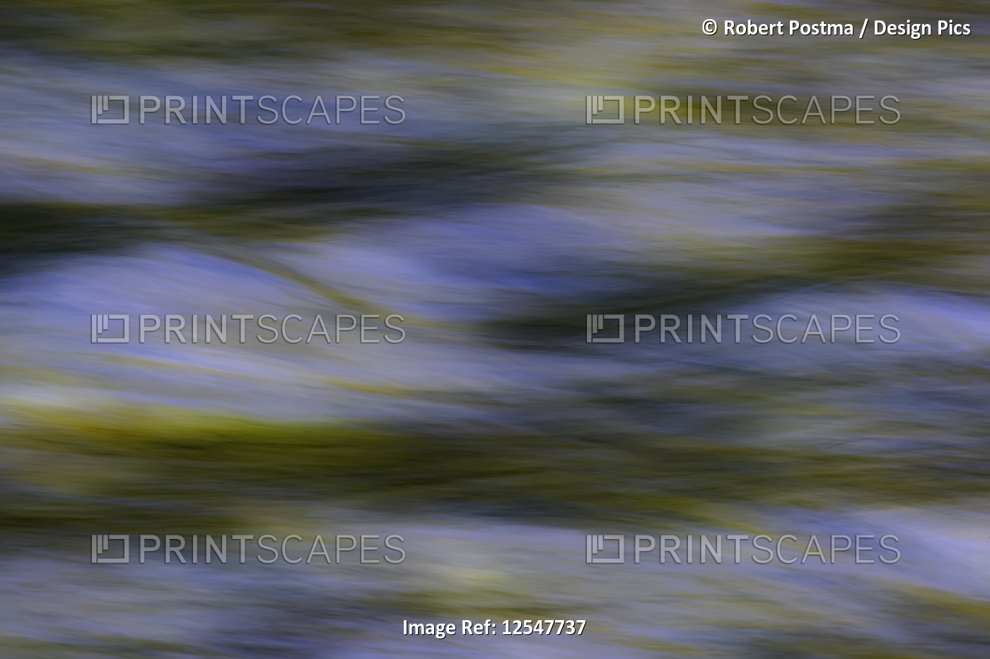 Abstract images of foliage reflected into moving water at sunrise; Atlin, ...