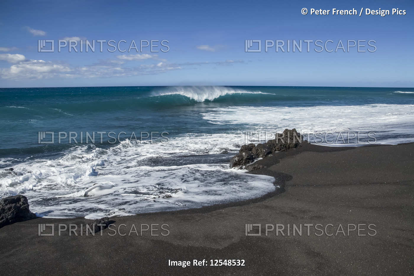 Surf breaking on the black sand beach, Pueo Bay, North Kona coast; Kailua-Kona, ...