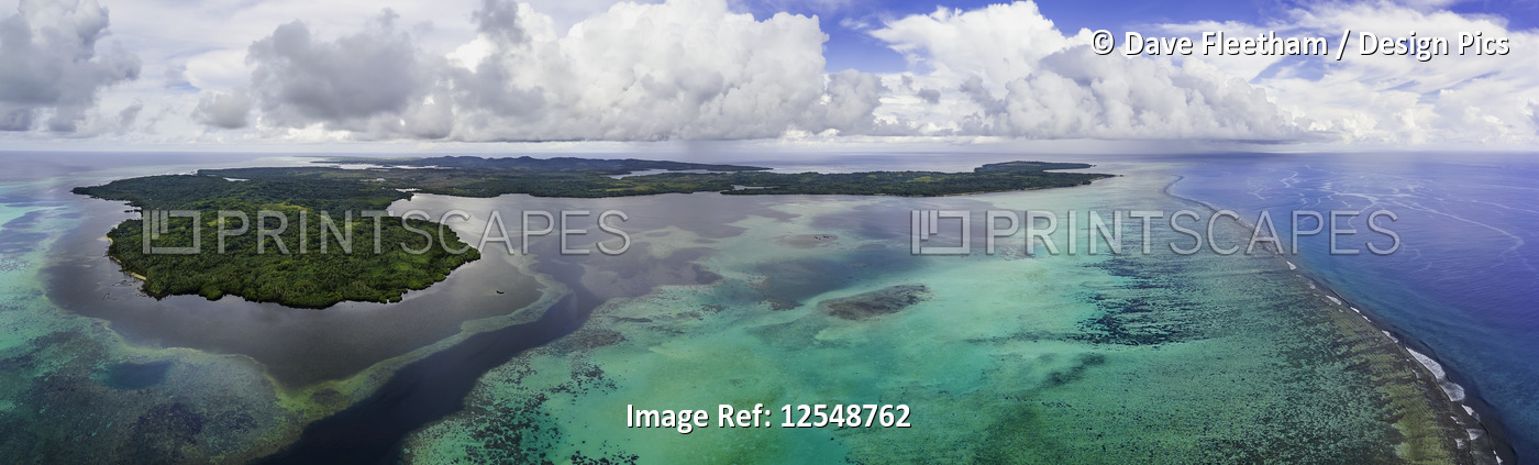 An aerial view above the outer reef and Goofnuw Channel looking south to the ...