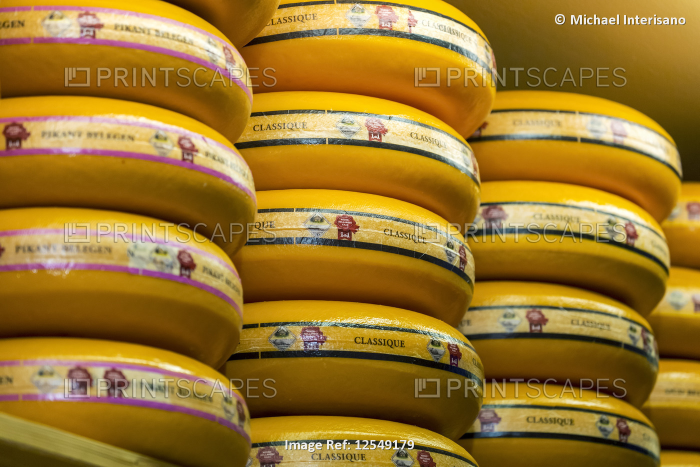 Close-up of large rounds of cheese on display; Delft, Netherlands