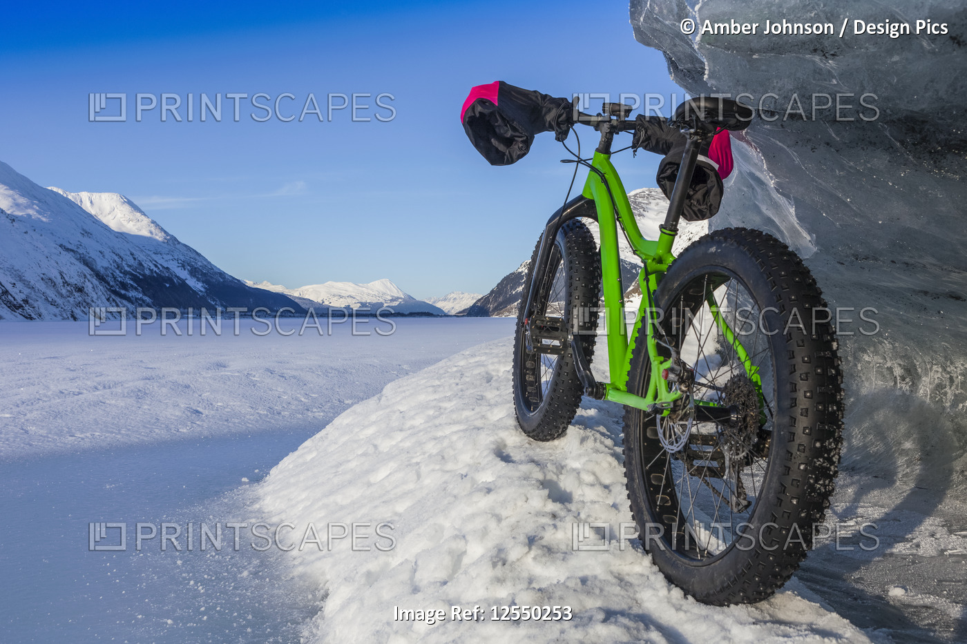 Green Fatbike 907 Whiteout bike resting on giant iceberg in winter on Portage ...