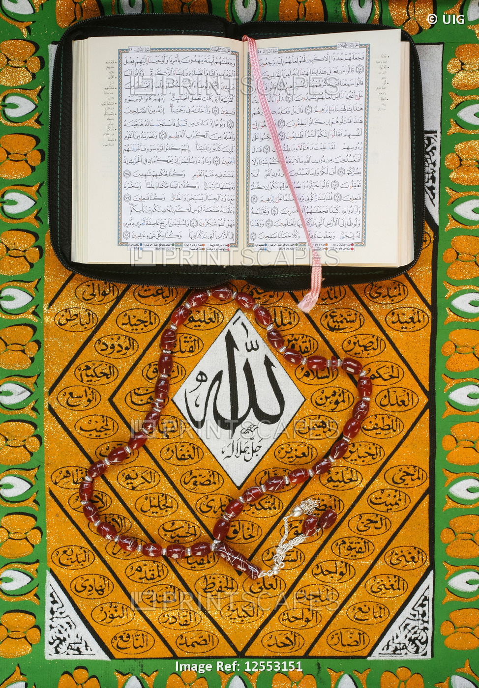 Koran, rosary and Allah calligraphy