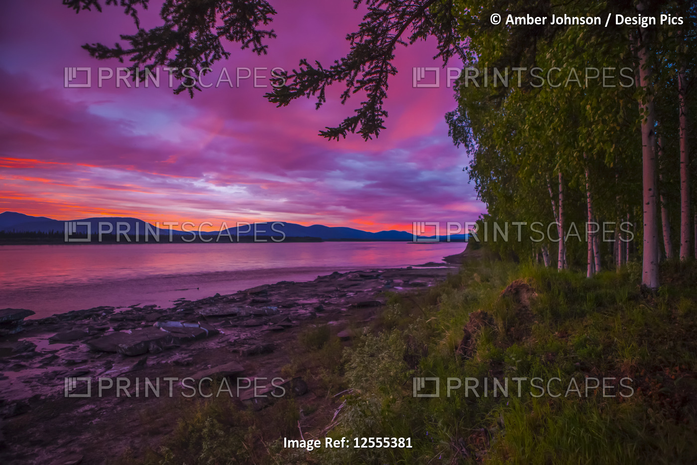 Sunset/sunrise in early June on the Yukon River in summer; Alaska, United ...