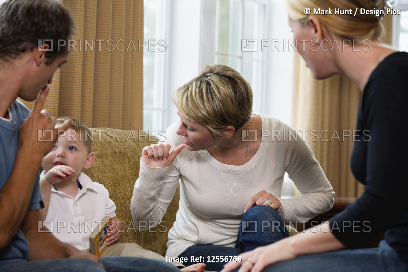 Family conversing in sign language