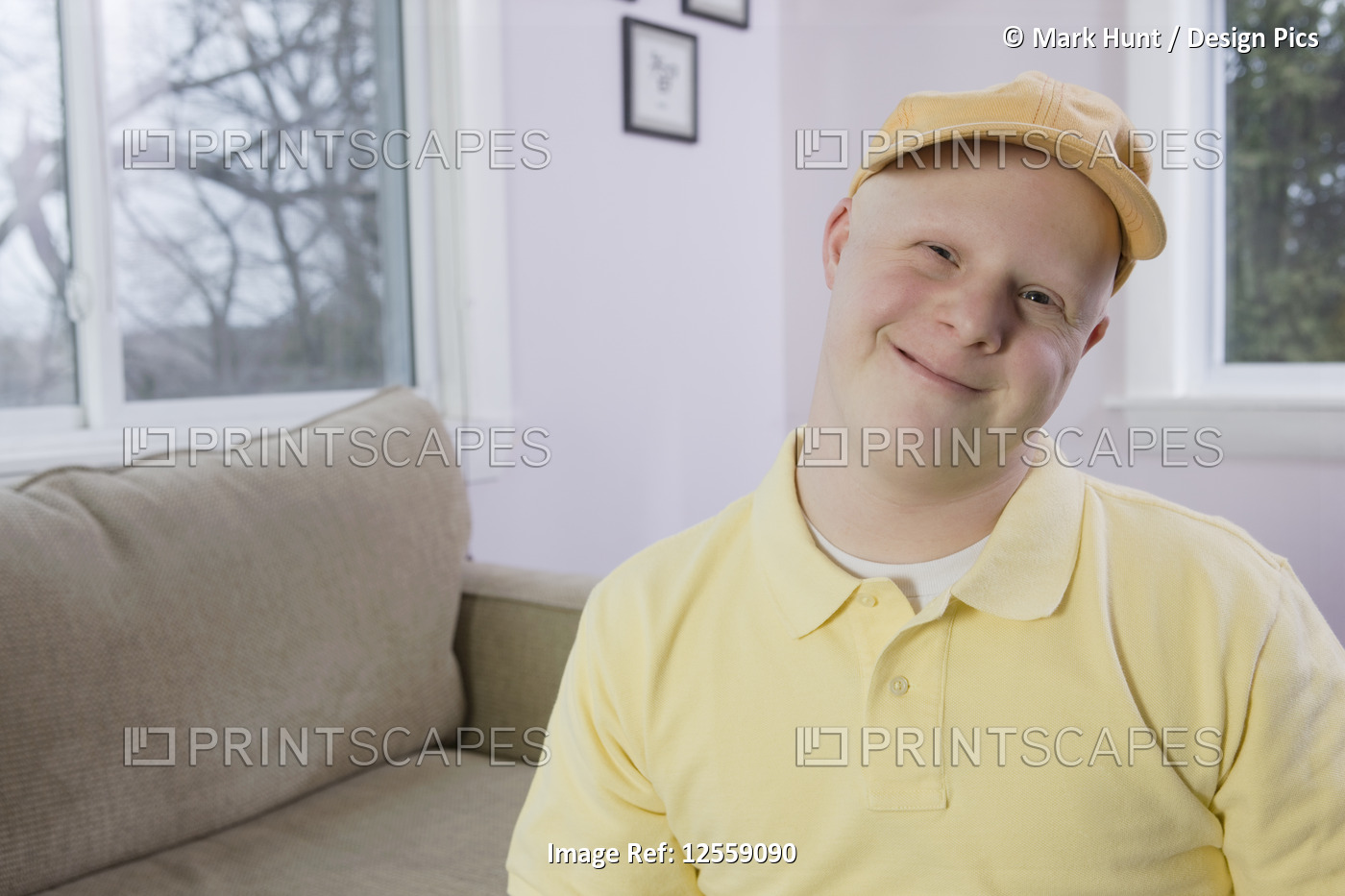 Portrait of a man with Down Syndrome smiling