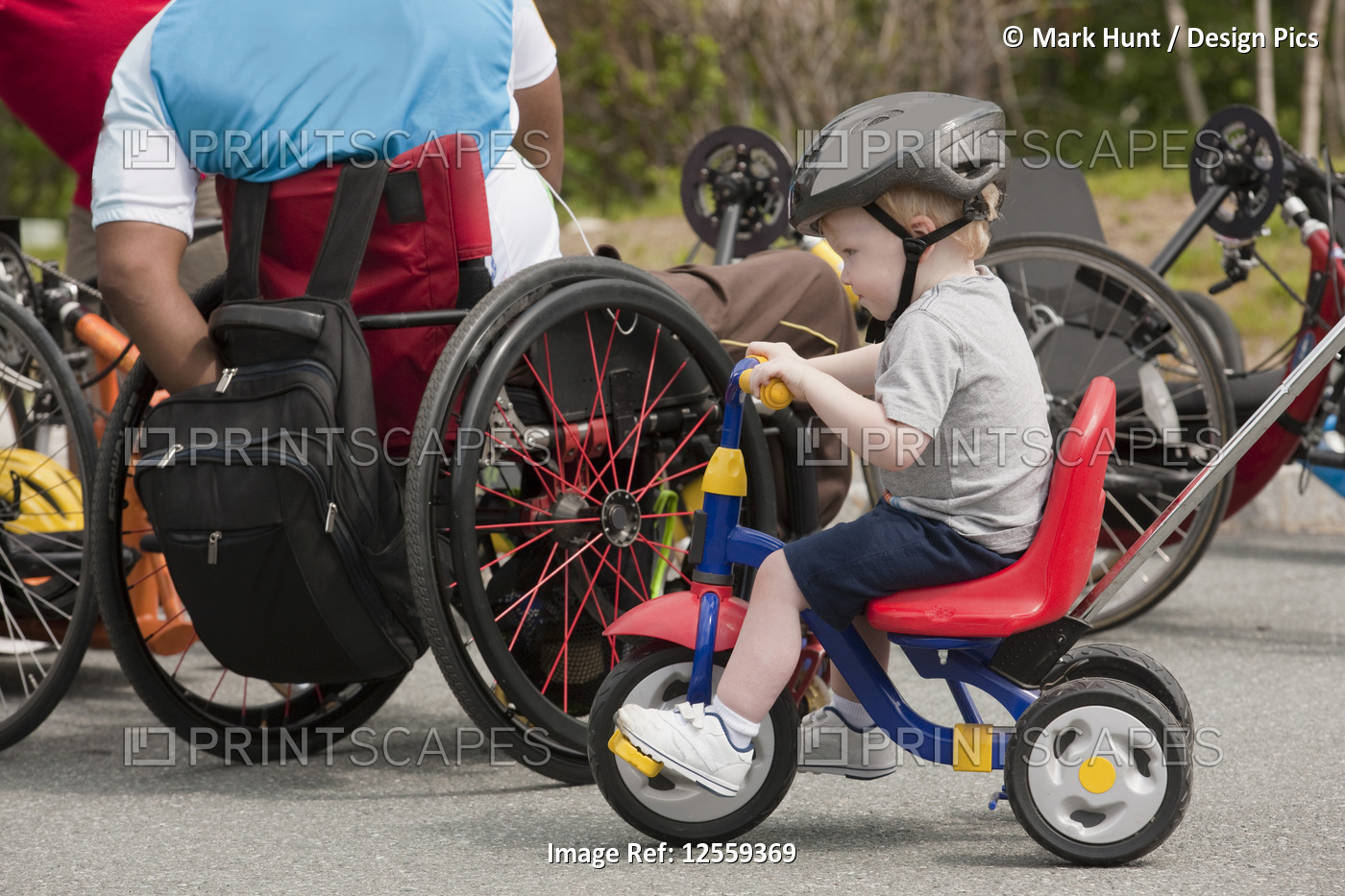 Man with spinal cord injury and boy with joint problems preparing for ...
