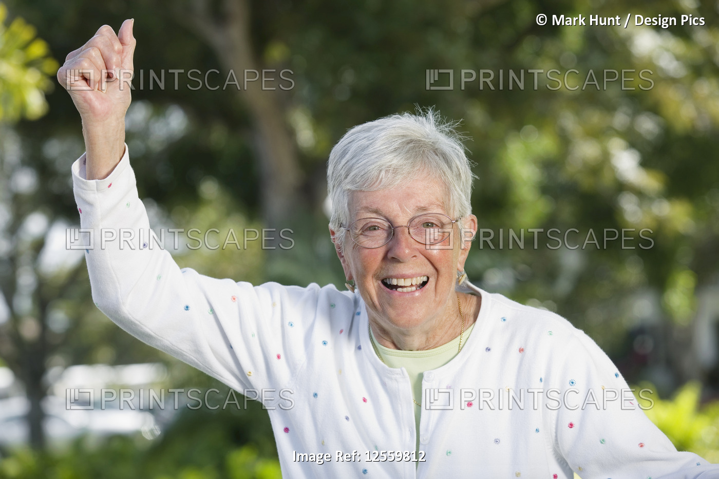 Portrait of a senior woman rejoicing.