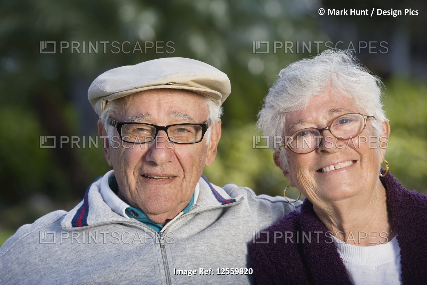 Portrait of a senior couple in a park.