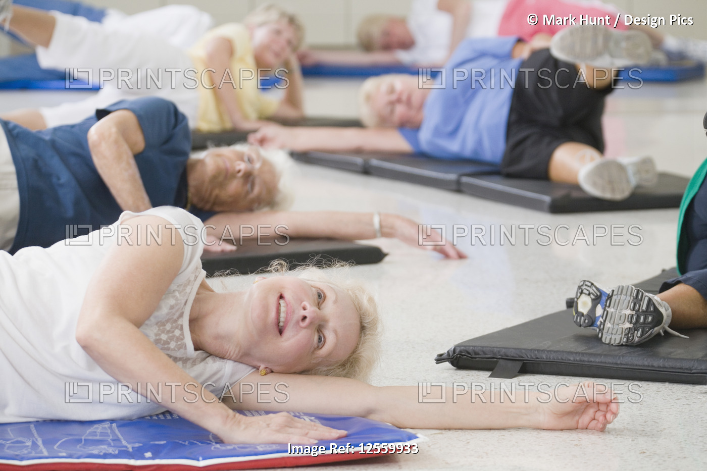 Senior women exercising in a gym