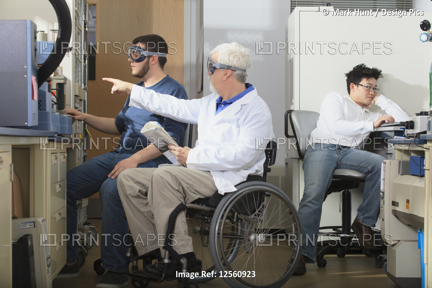 Professor with muscular dystrophy and engineering student using the ...