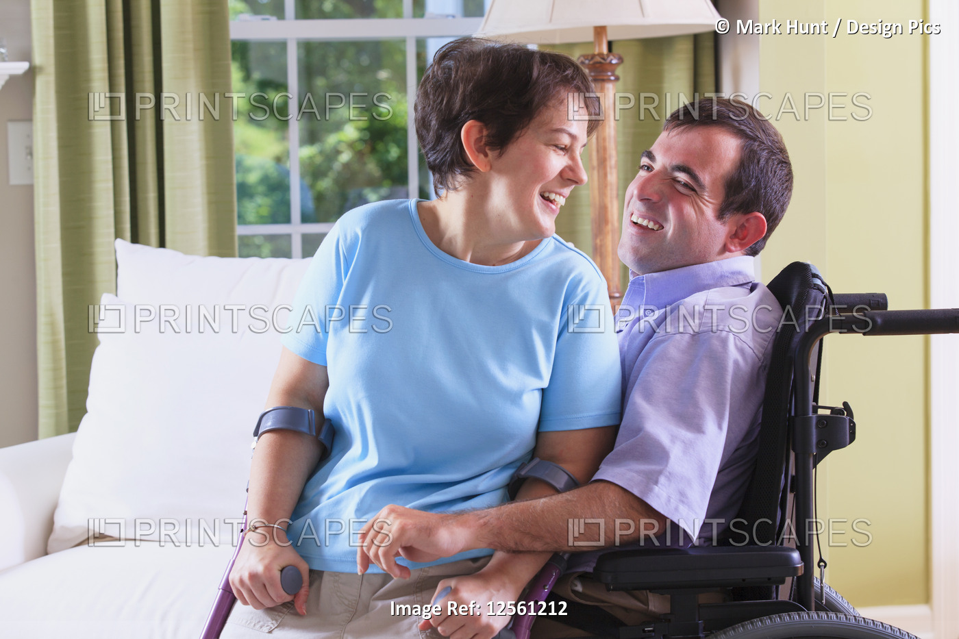 Couple with cerebral palsy sitting together