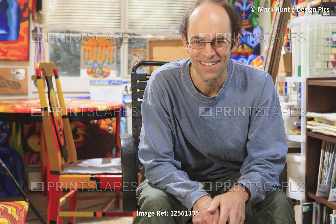 Portrait of an artist with Asperger's in his studio