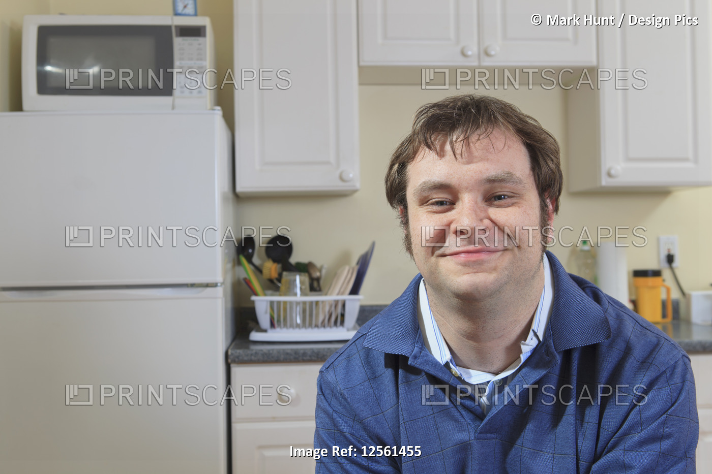 Portrait of a man with Asperger's in his home living independently