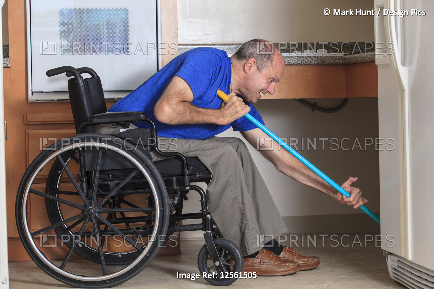 Man with Friedreich's Ataxia and deformed hands cleaning his house from his ...
