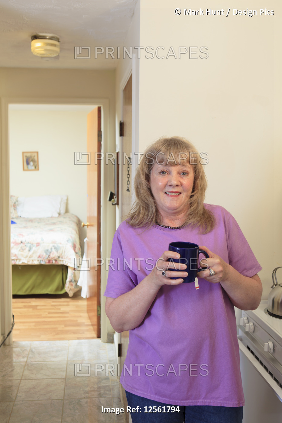 Woman with Bipolar disorder relaxing at home with tea