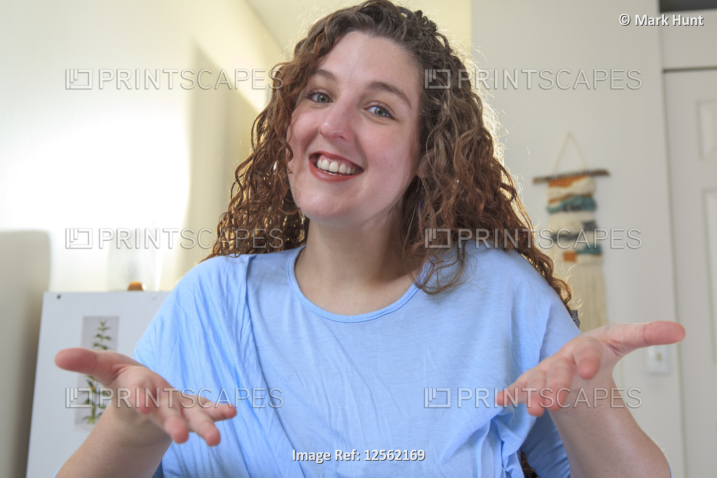 Woman with Muscular Dystrophy being expressive with her hands